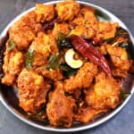 Mangalorean chicken urval (uruval) - Spicy chicken dry recipe as appetizer or side dish.