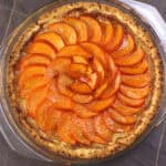Persimmon pie with custard filling and homemade pie crust - unique dessert recipe for fall & holiday.