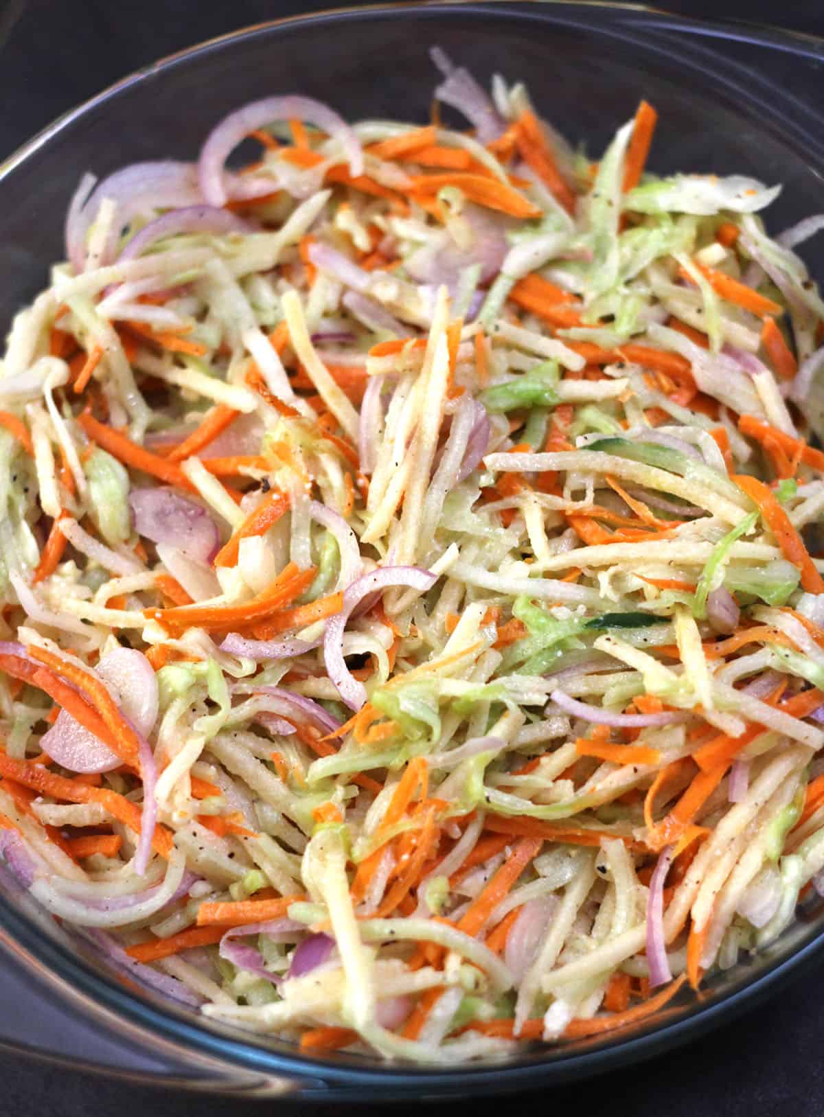 Apple slaw with cashew lemon dressing. Vegan and gluten-free meal prep salad recipe. 