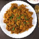 Easy Chettinad chicken biryani recipe - spicy one-pot chicken biryani with raita.