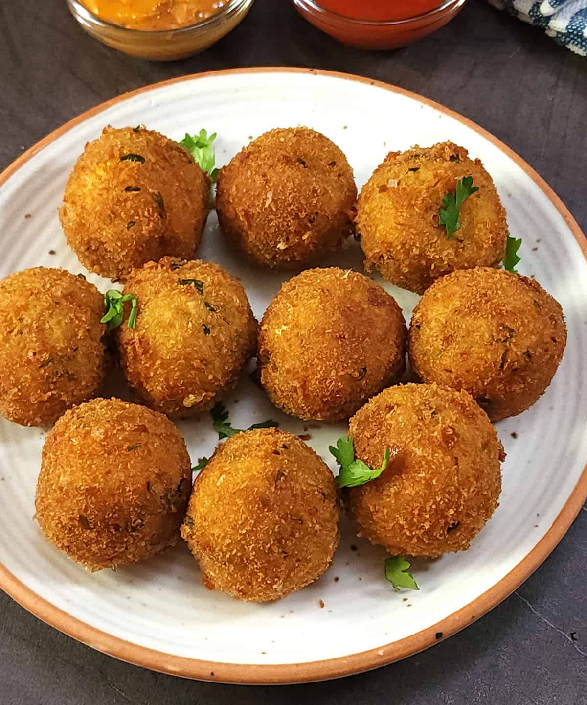 Crispy cheese balls with corn and potatoes. Easy bite sized appetizer or snack recipe for parties.