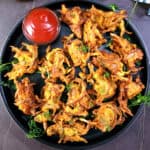 Crispy onion pakoda, Onion fritters (kanda bhaji), Evening snack, party appetizer, and finger food.