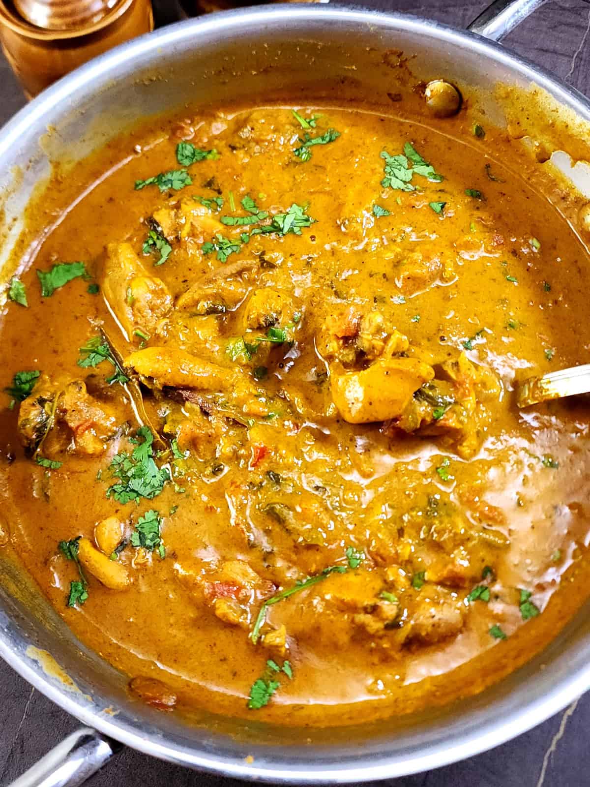 Indian chicken curry - simple & easy to make. Best served with Indian breads and rice for any meal.