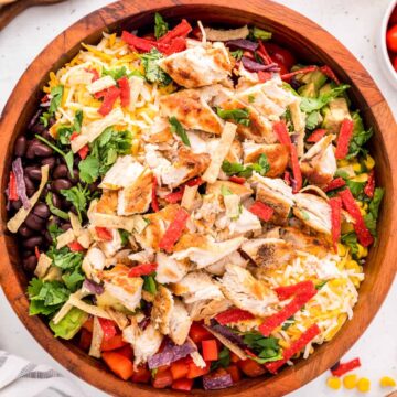 Southwest Salad with grilled shredded chicken in a bowl