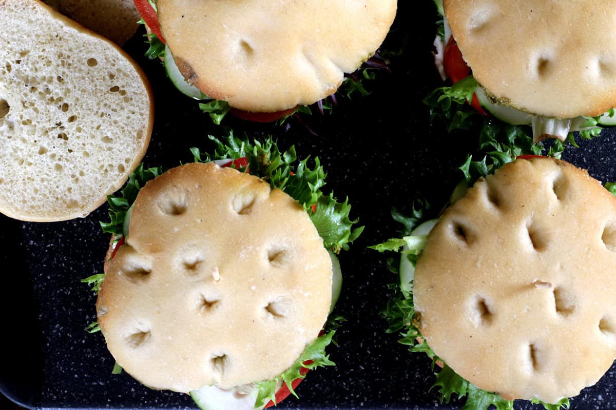 Crispy crust homemade ciabatta bread rolls and sandwich.