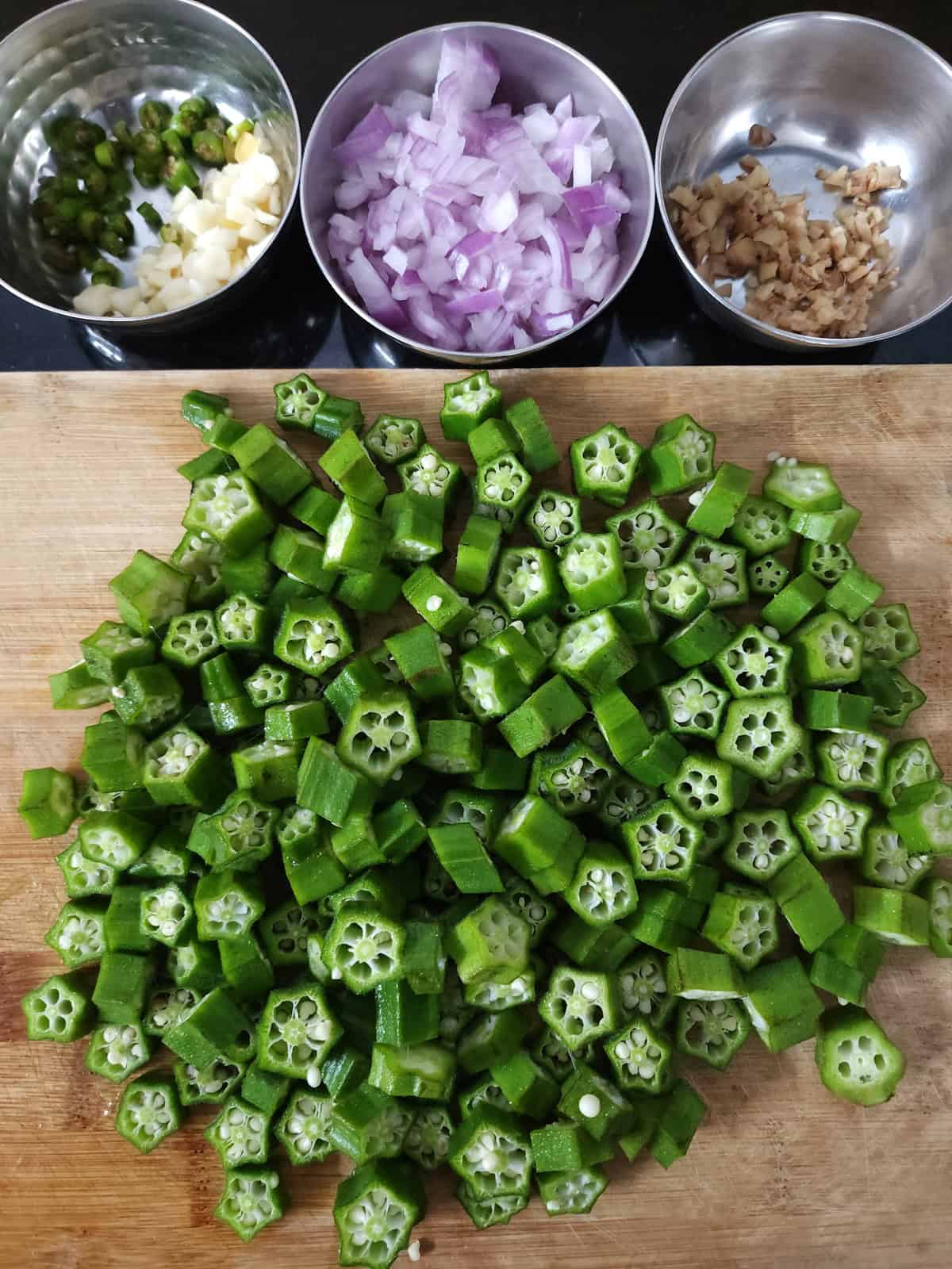Ingredients used to make crispy okra or bhindi fry.