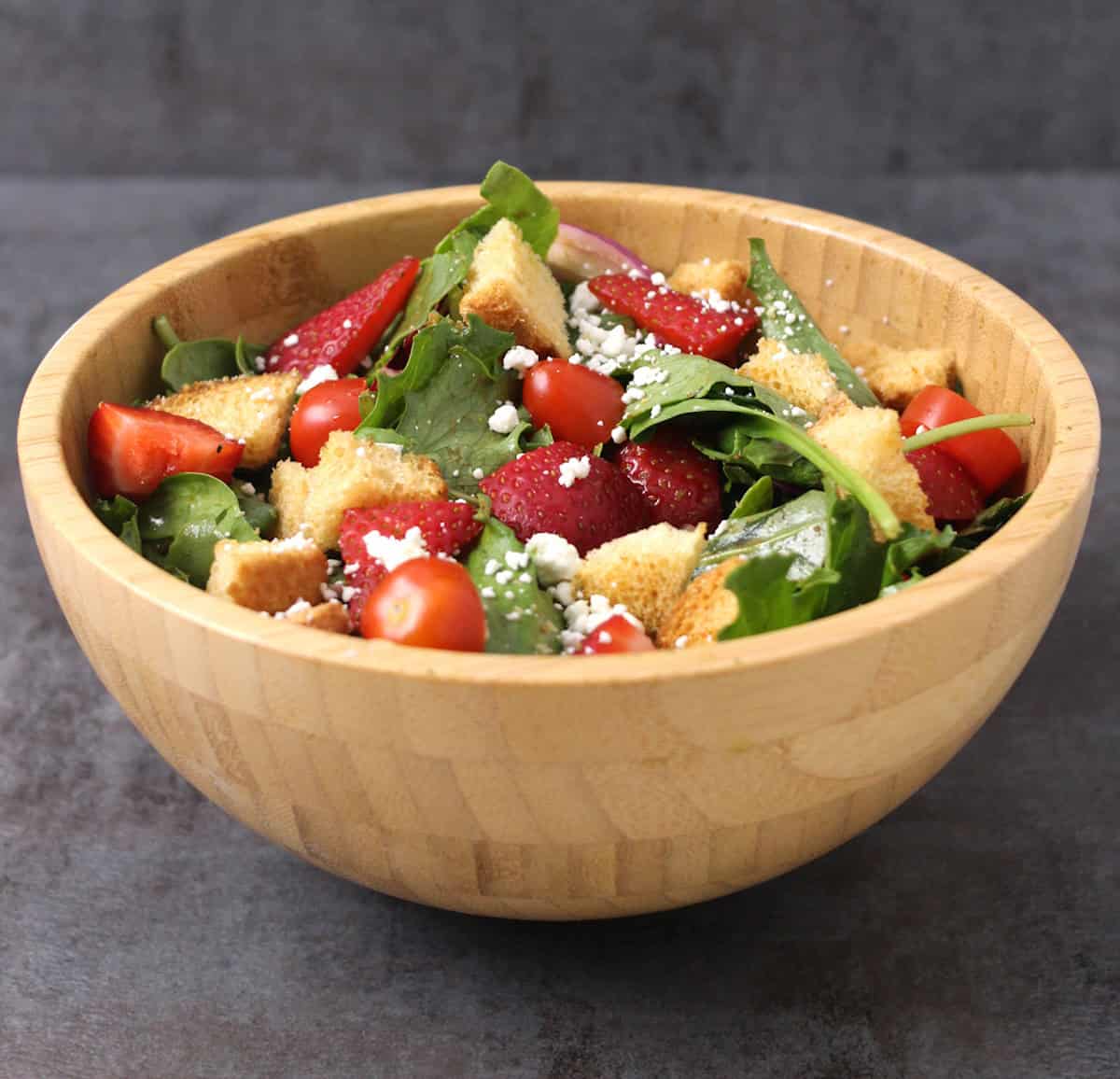 Quick and fresh 5-minute salad for any meal. Strawberry salad with balsamic vinaigrette dressing.